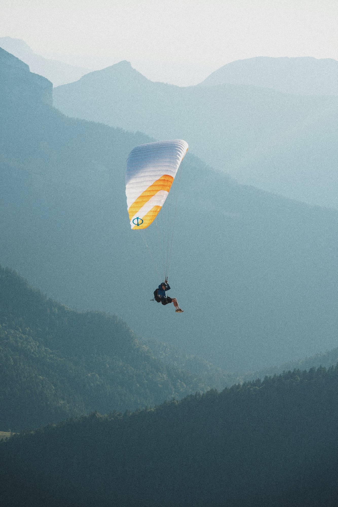 Person working with laptop representing the journey of starting a blog